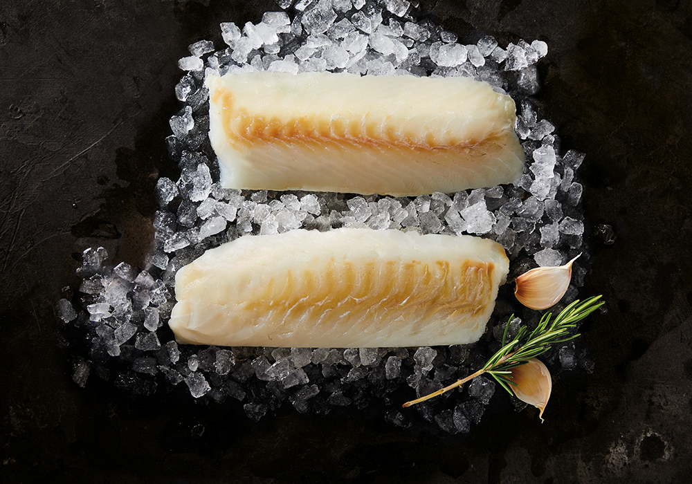 Atlantic Cod Loins on ice with garlic